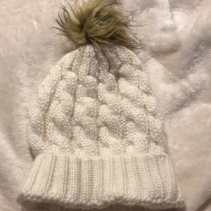 white fluffy winter hat